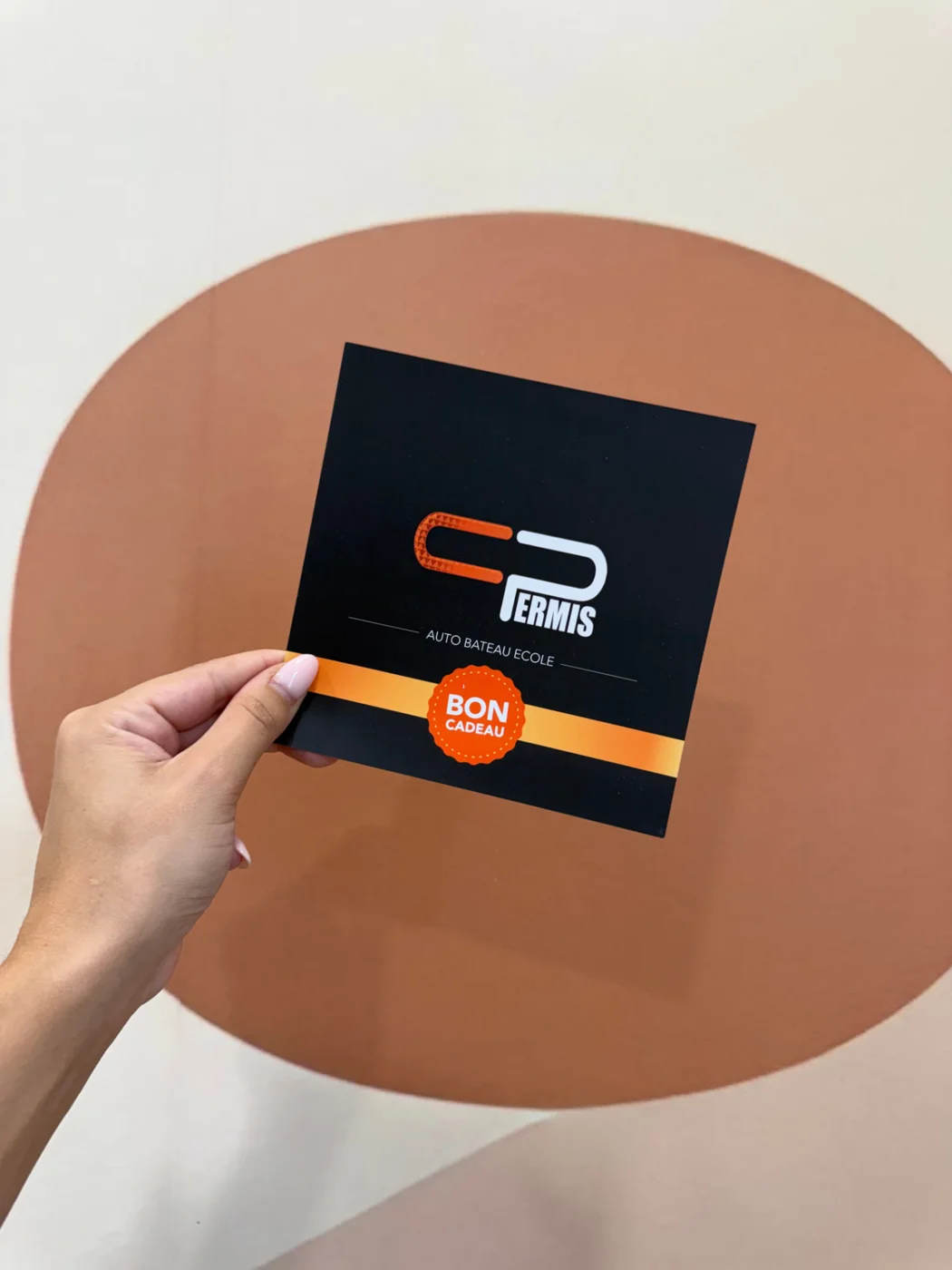Bon cadeau noir et orange C Permis